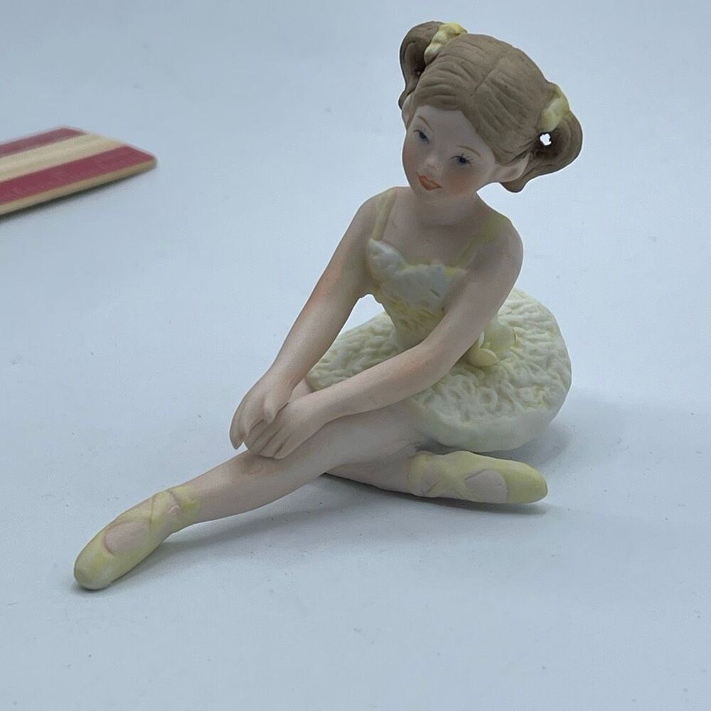 Vintage Enesco stretching ballerina figurine.